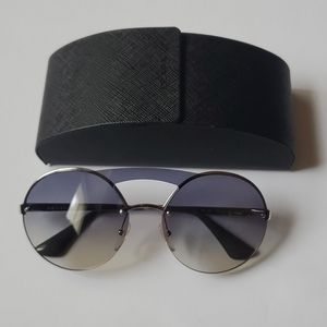 Prada Round Sunglasses in Gray/Silver